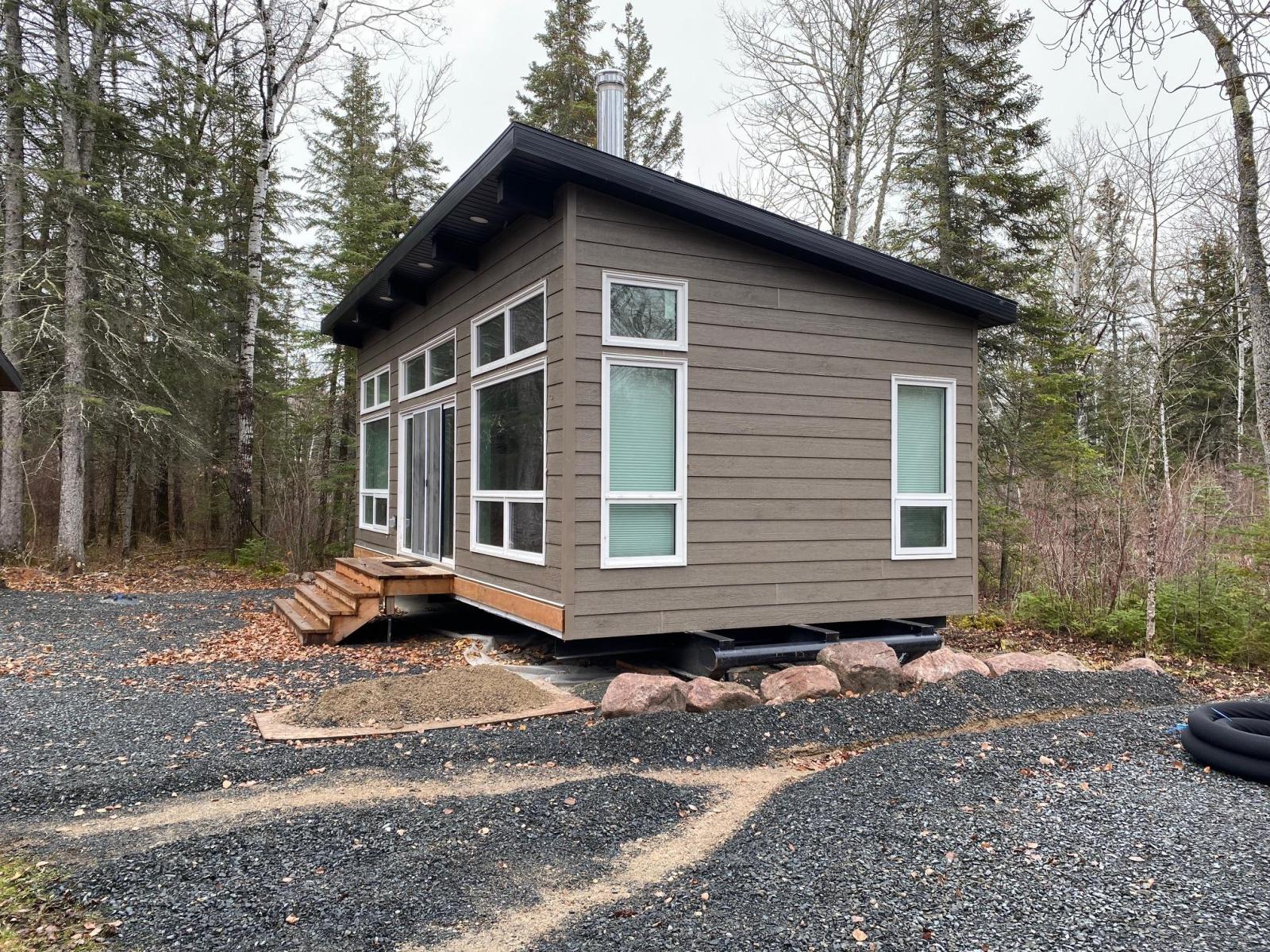 Big Whiteshell Cottage for Sale with Water Access - Guest Cabin Side View