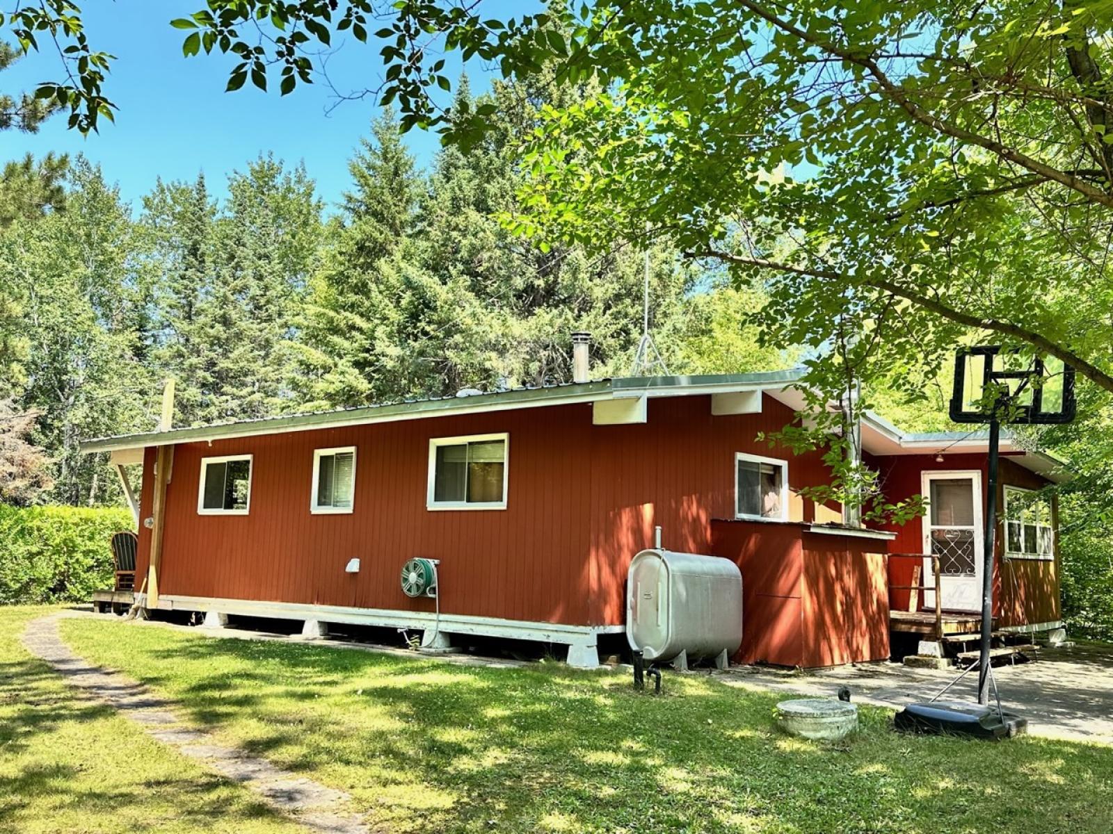 Big Whiteshell Back Lot Cottage for Sale with Dock at Waters Edge