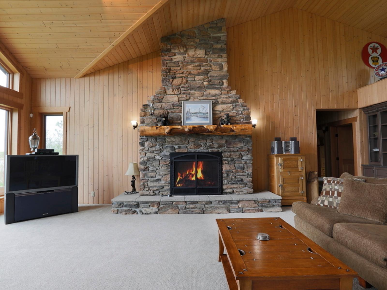 Family Room Fireplace - Falcon Lakefront 